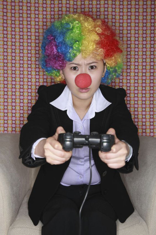 Illustration for article titled Fake Gamer of the Week: If She's Going to Play With You Clowns She Might as Well Look the Part